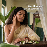 A woman in a cream sari presses serum into her cheek beside a window, card on using two to three drops under sunscreen in the morning and before retinol at night