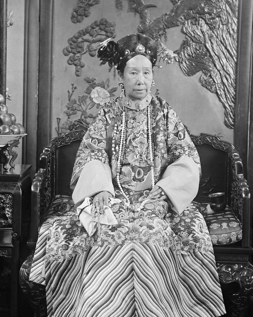 Empress Dowager Cixi seated at court, photographed by Yu Xunling around 1903