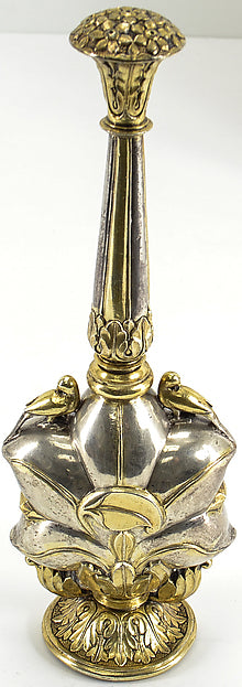 A slender rose water sprinkler, called a gulab pash